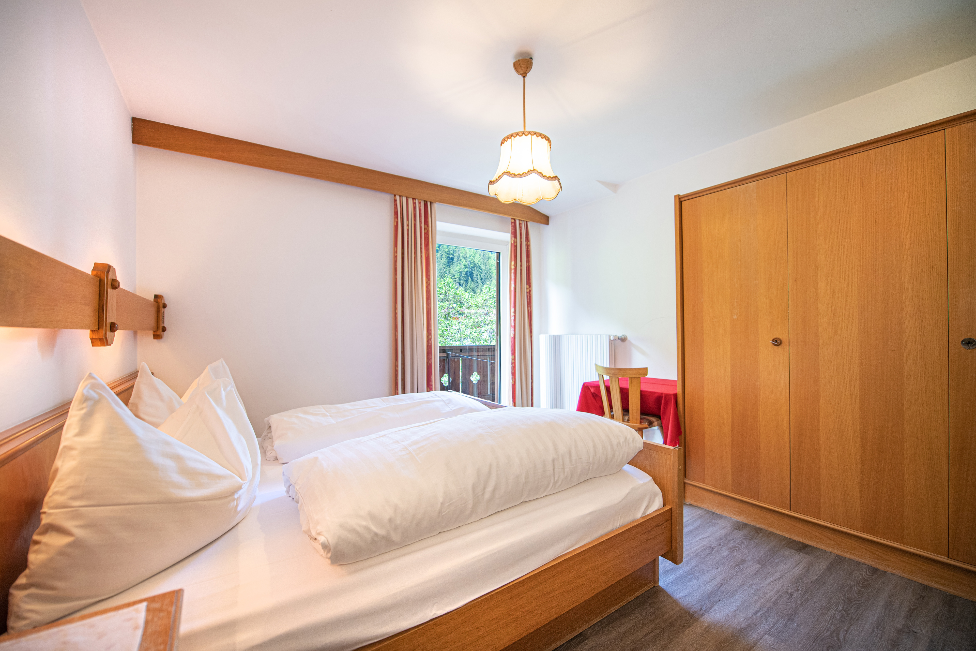 Ferienwohnung mit 3 Schlafzimmer und Balkon – Wolkenstein, Gröden · 3 Schlafzimmer