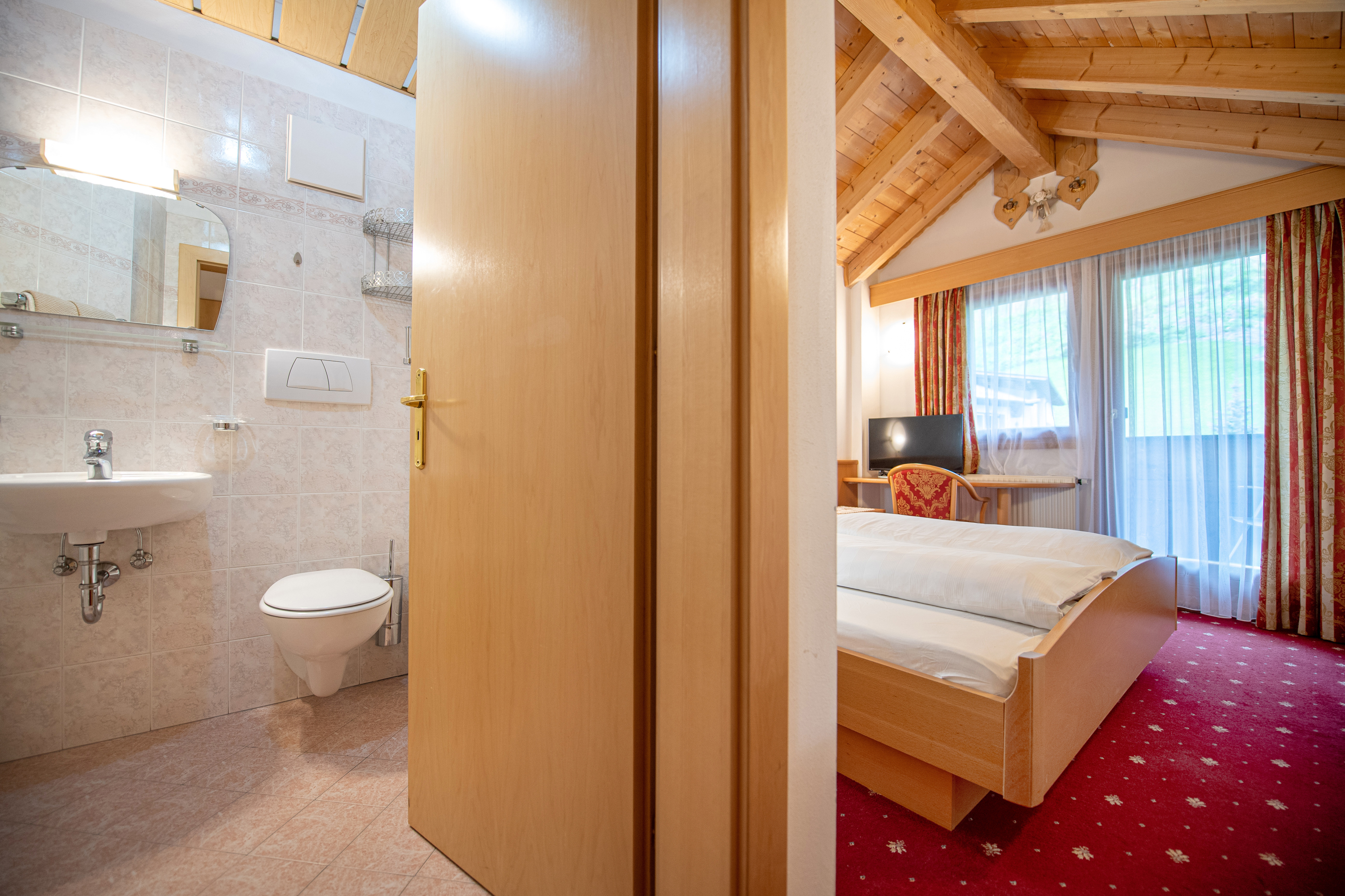 Dachgeschosswohnung mit 3 Schlafzimmern, 3 Bädern und 3 Balkone – Sankt Christina, Gröden · 3 Schlafzimmer